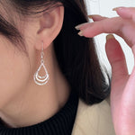 Sterling Silver Textured Graduated Open Teardrop Dangling Style Earrings